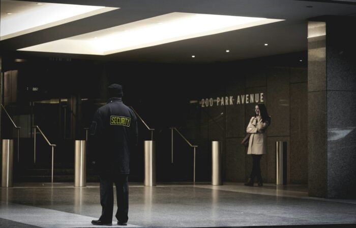 security guard standing on the gray floor