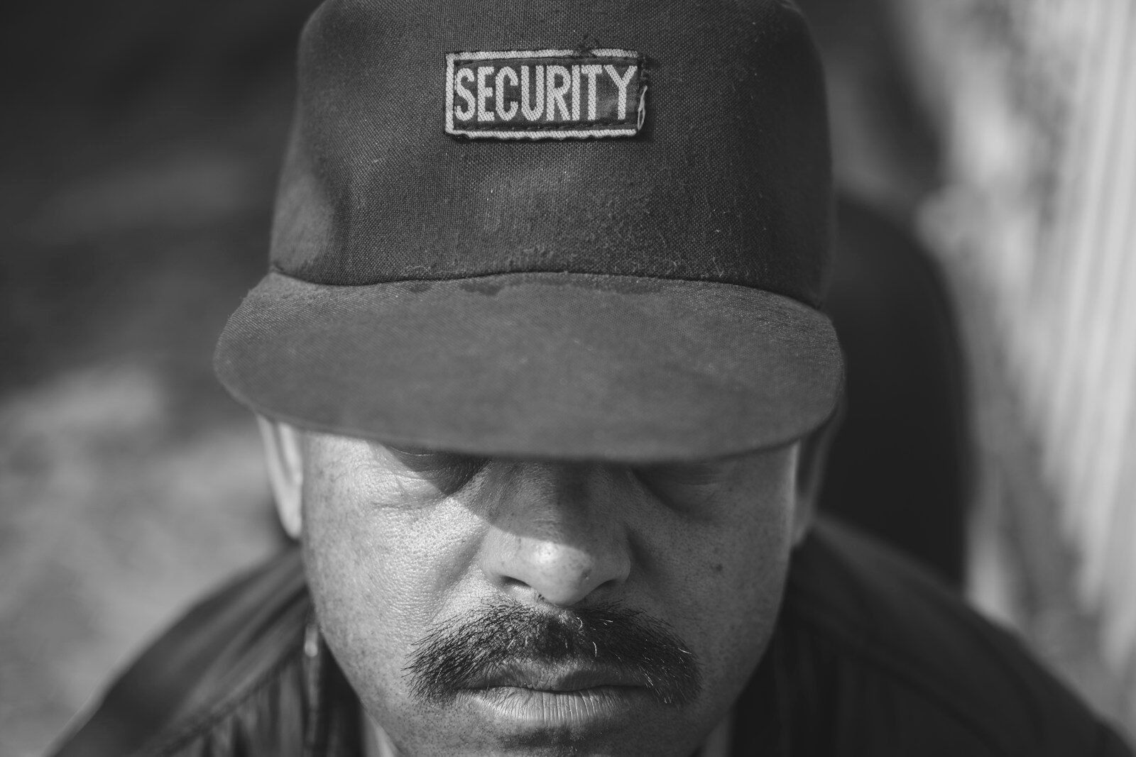man wearing security cap